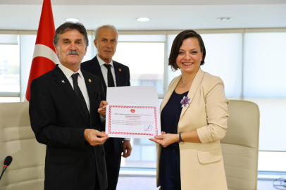 TEMAD’dan Başkan Kınay’a onursal berat